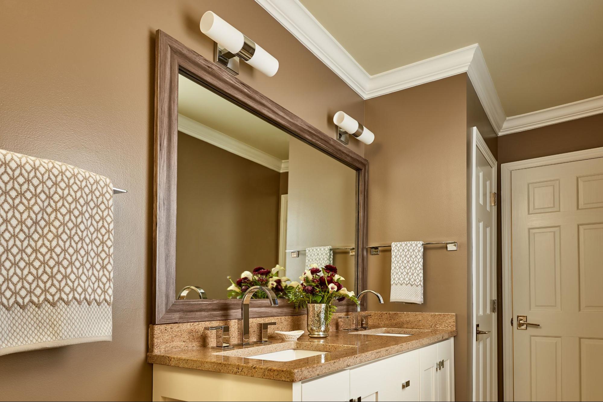 Gold and Bold Bathroom Decor Style with a Wood Mirror Frame