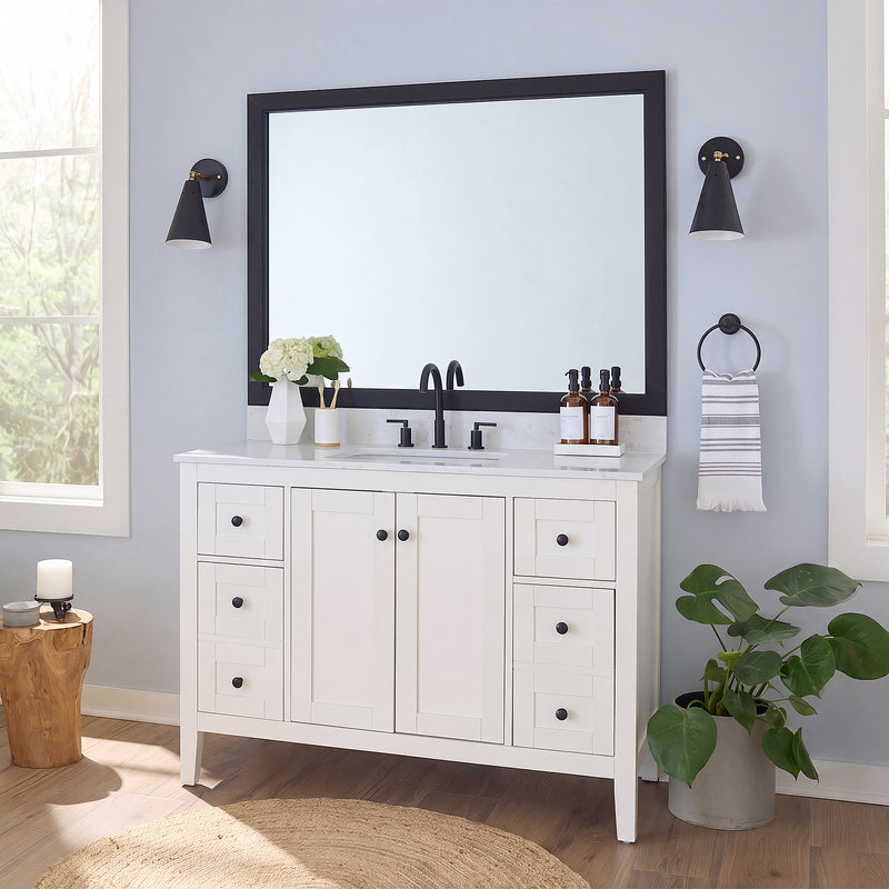 Annandale Black Slim MirrorMate frame on a bathroom vanity mirror