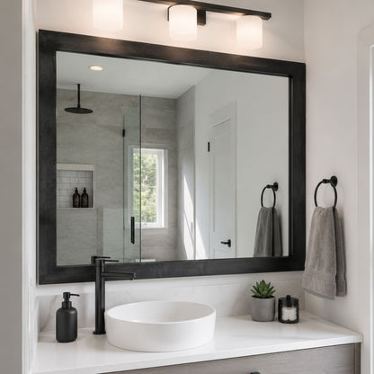 Austin Gunmetal Grey Slim MirrorMate frame on a modern single vanity bathroom mirror