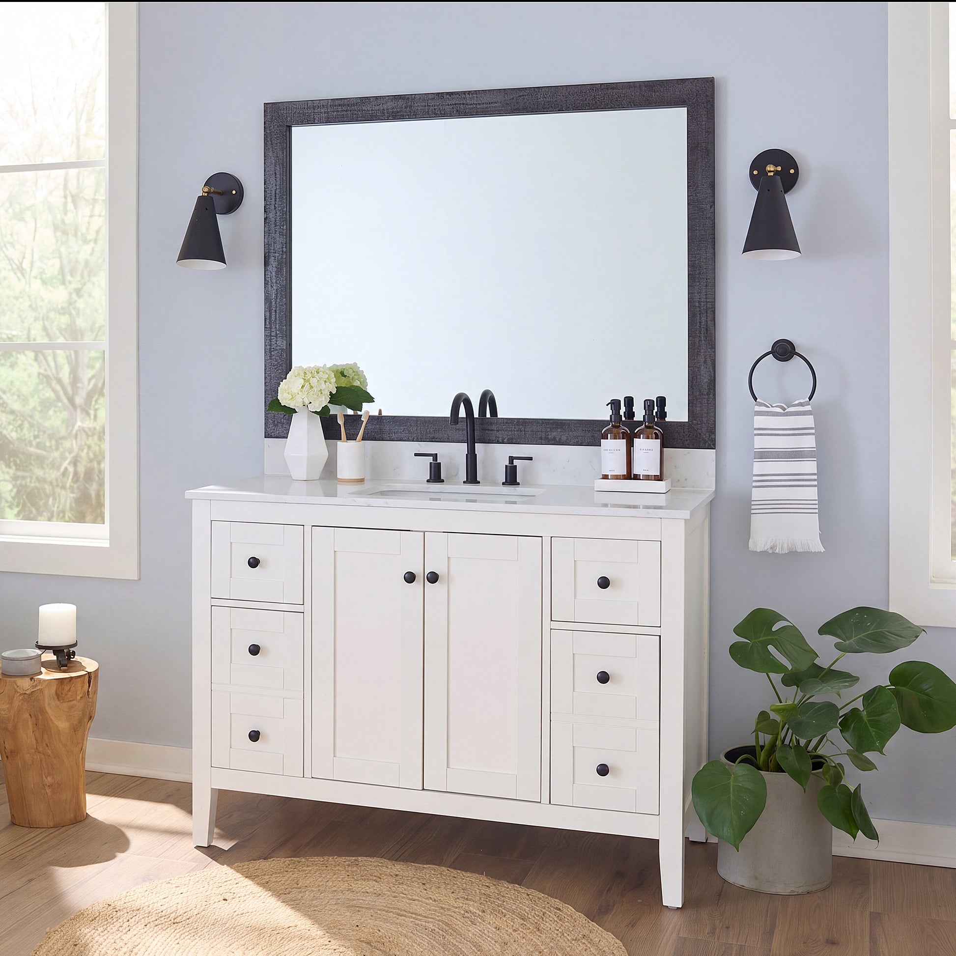 Big Sur Ash Black MirrorMate frame on a bathroom vanity mirror