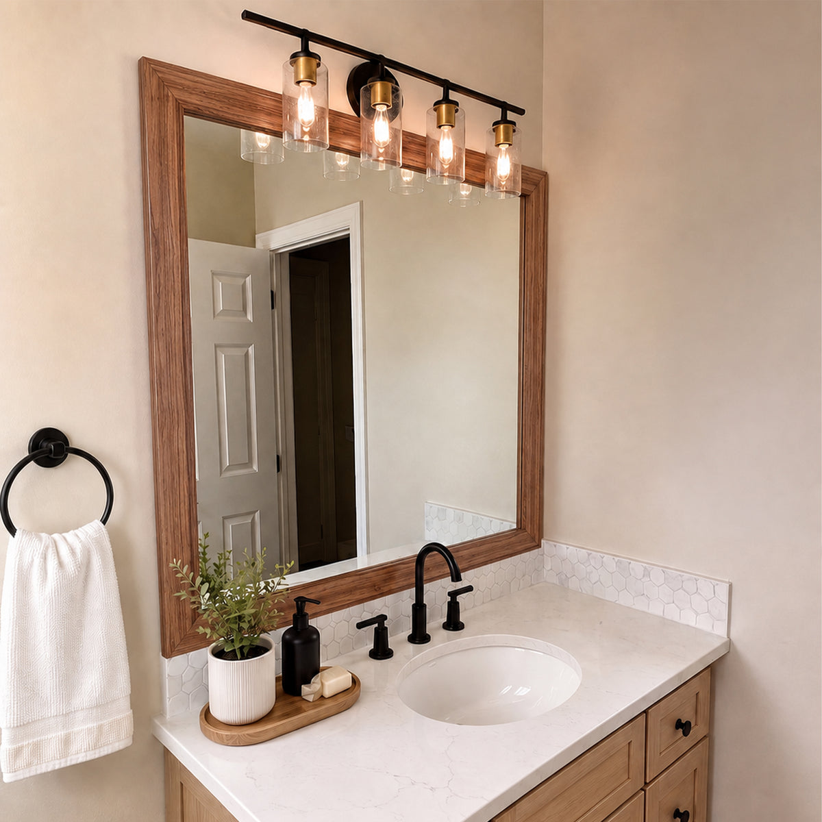 Big Sur Warm Teak MirrorMate bathroom mirror frame above a single vanity with black fixtures