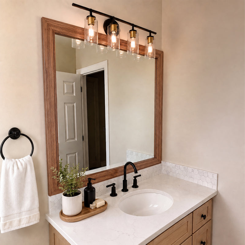 Big Sur Warm Teak MirrorMate bathroom mirror frame above a single vanity with black fixtures