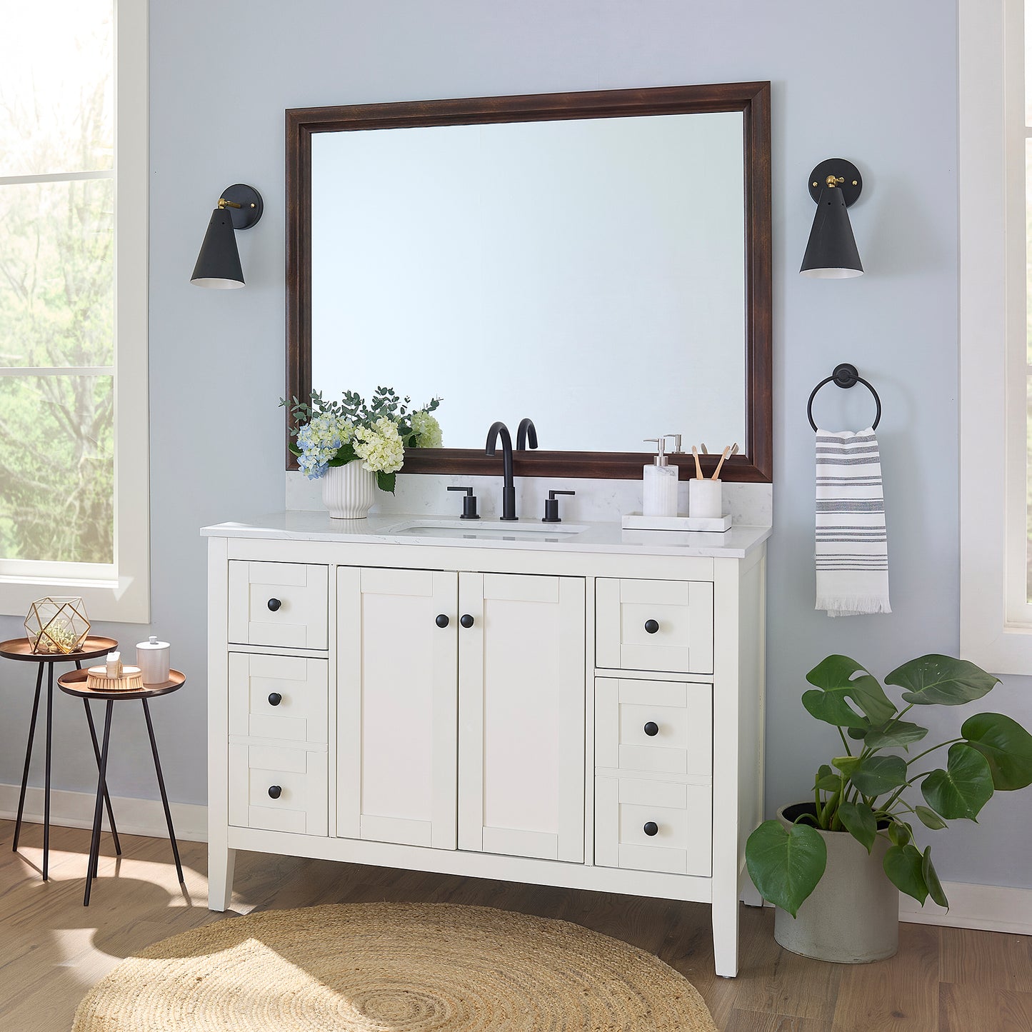 Chelsea Brushed Bronze MirrorMate frame on a bathroom vanity mirror