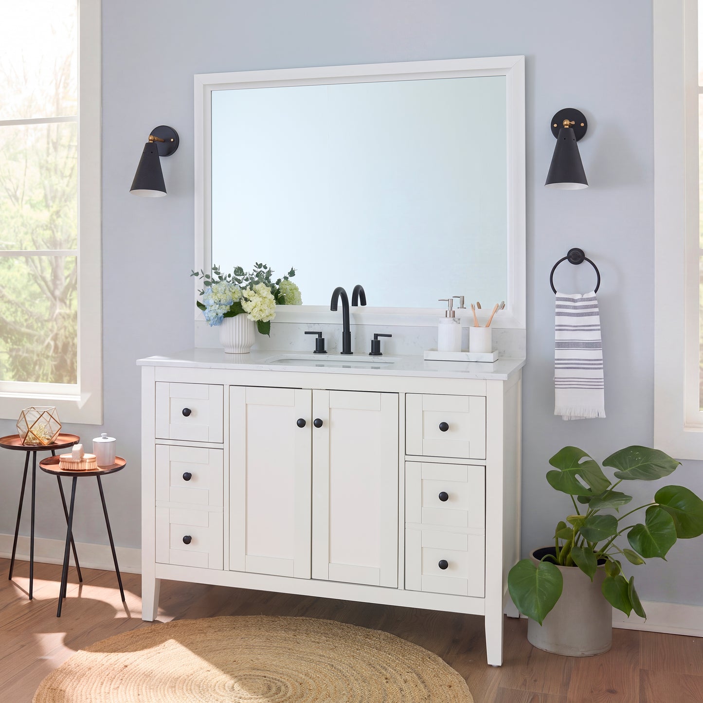 Chelsea Classic White MirrorMate frame on a bathroom vanity mirror