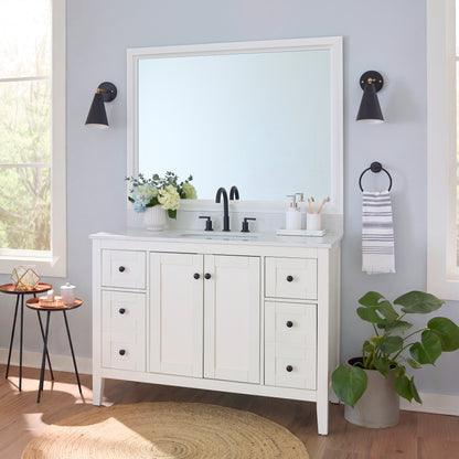 Chelsea Classic White MirrorMate frame on a bathroom vanity mirror