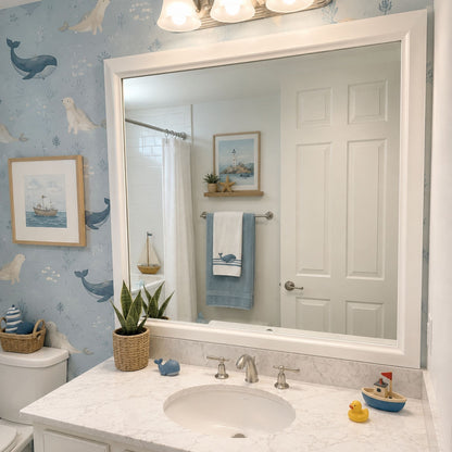 Chelsea Classic White MirrorMate frame above a vanity in a coastal kids bathroom