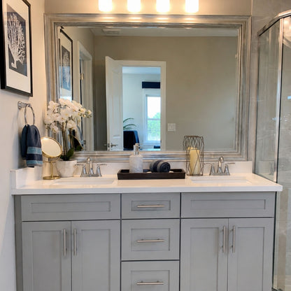 Chelsea Silver Streak MirrorMate frame above a gray double bathroom vanity