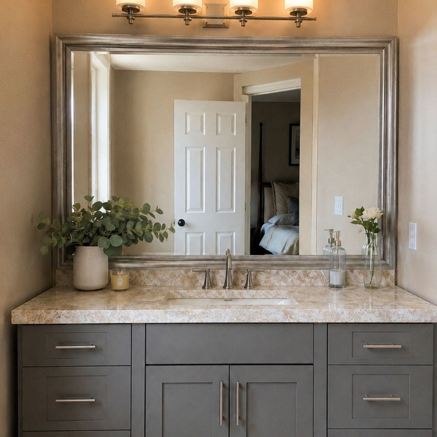 Chelsea Silver Streak MirrorMate frame above a gray single bathroom vanity