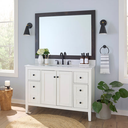 Cherokee Espresso Walnut MirrorMate frame on a bathroom vanity mirror
