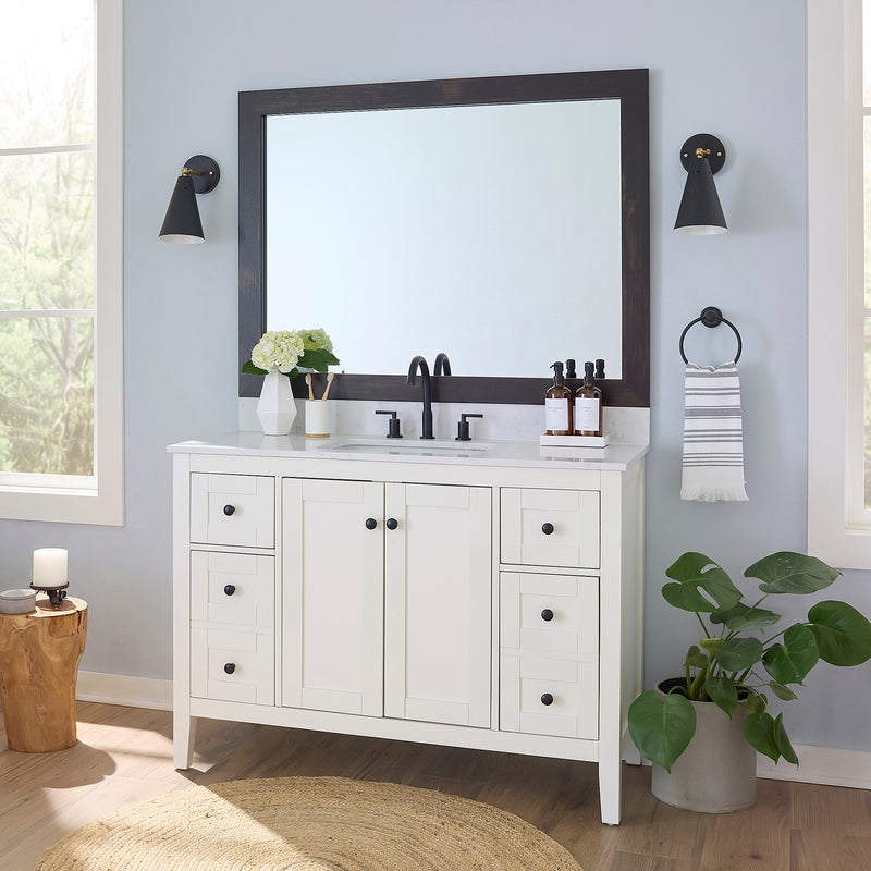 Cherokee Espresso Walnut MirrorMate frame on a bathroom vanity mirror