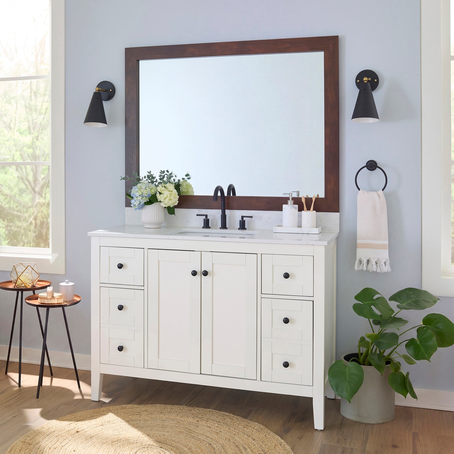 Cherokee Mocha Walnut MirrorMate frame on a bathroom vanity mirror