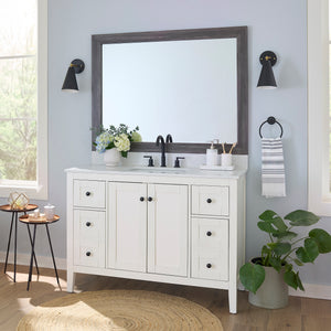 Cherokee Montauk Driftwood MirrorMate frame on a bathroom vanity mirror