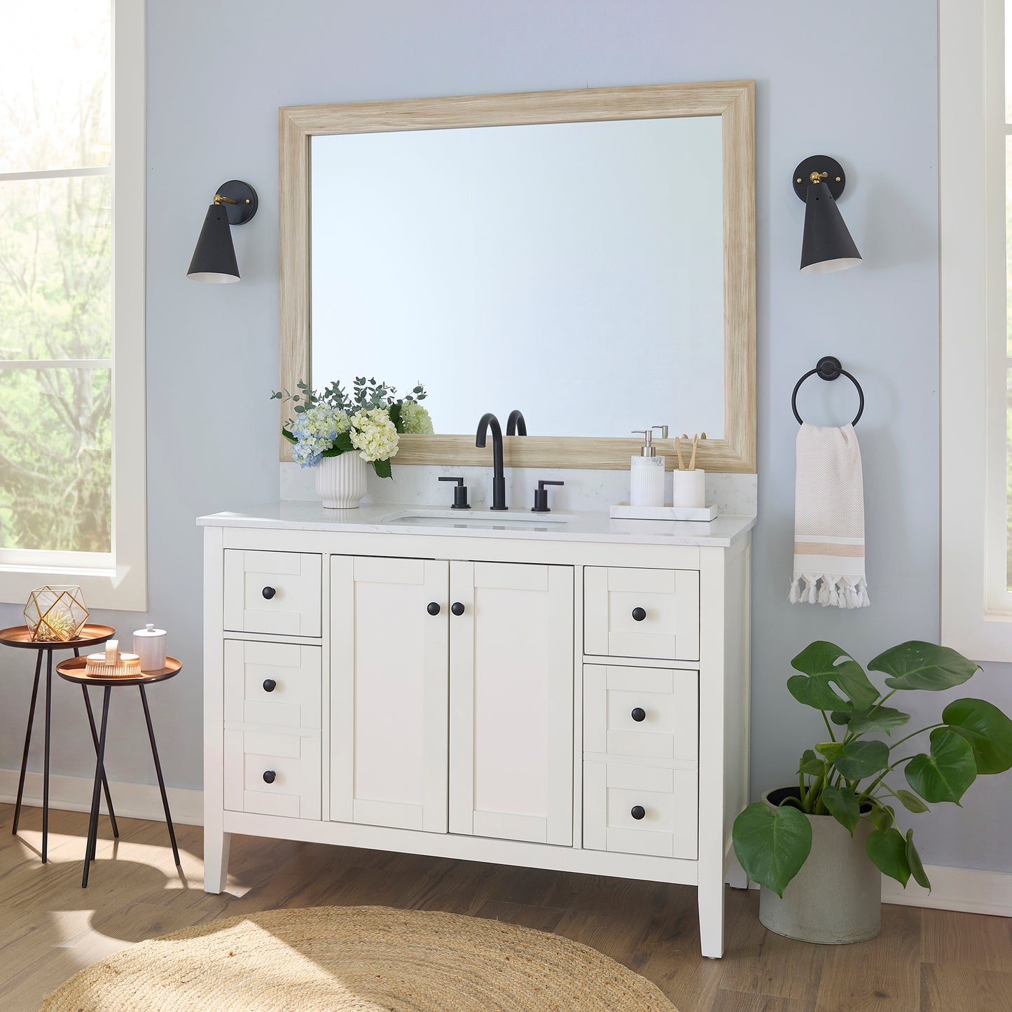 Cherokee Montauk Sand MirrorMate frame on a bathroom vanity mirror