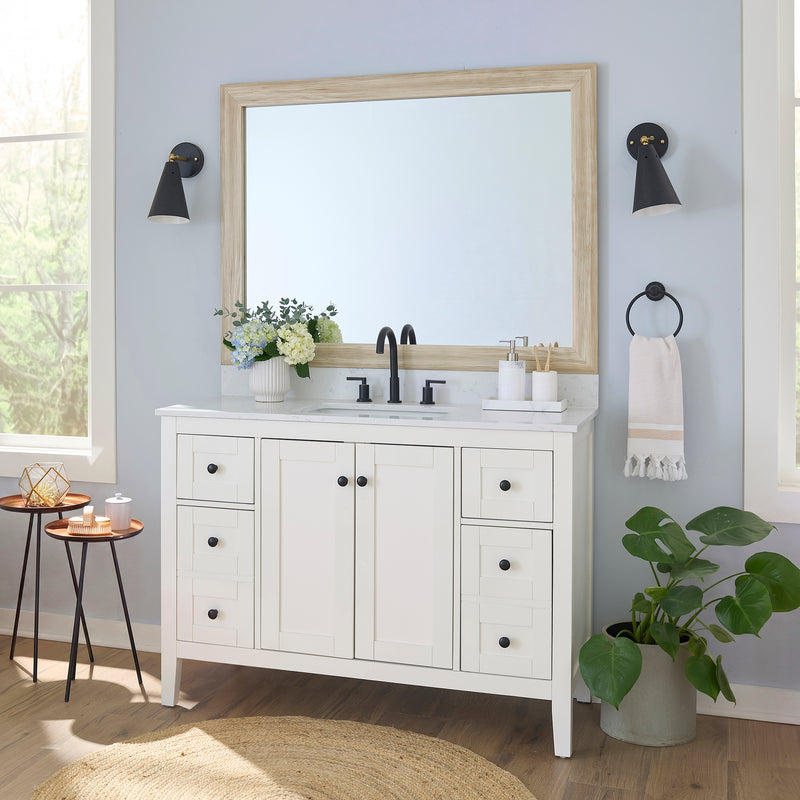 Cherokee Montauk Sand MirrorMate frame on a bathroom vanity mirror