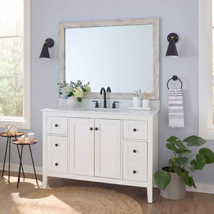 Corner Woods Weathered White MirrorMate frame on a bathroom vanity mirror