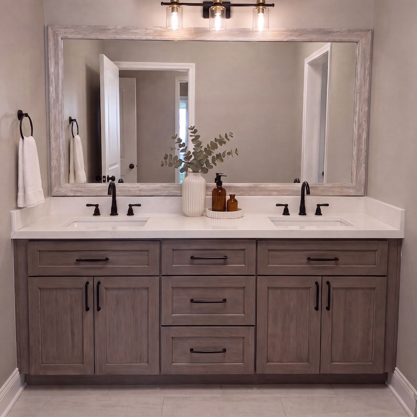 Corner Woods Weathered White MirrorMate frame above a double bathroom vanity