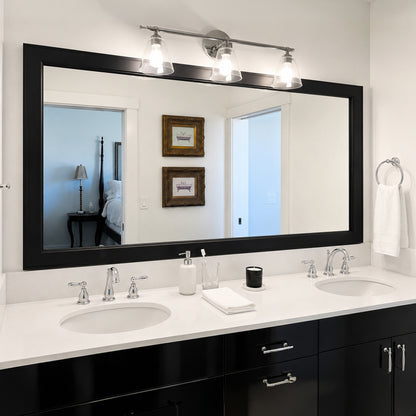 Essex Black Tie MirrorMate frame above a black double bathroom vanity