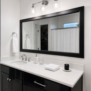 Essex Black Tie MirrorMate frame above a wide black bathroom vanity