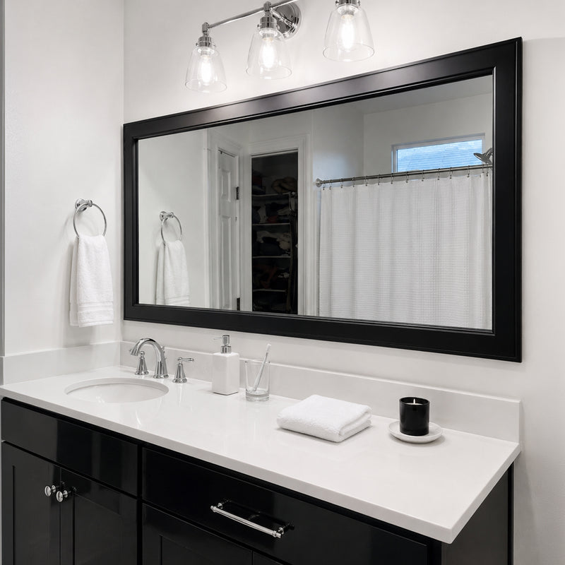 Essex Black Tie MirrorMate frame above a wide black bathroom vanity