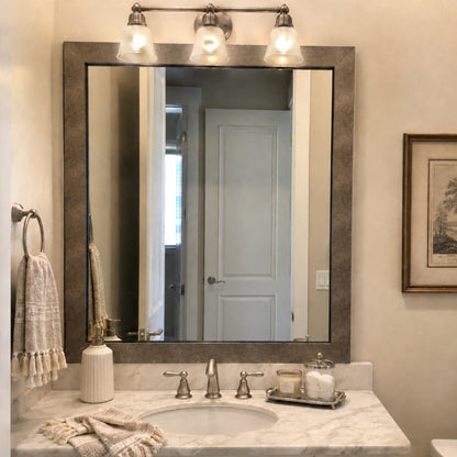 French Quarter Crackled Silver MirrorMate frame above a single bathroom vanity in a warm neutral bathroom
