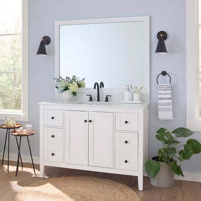 Highline Paintable Slim MirrorMate frame on a bathroom vanity mirror