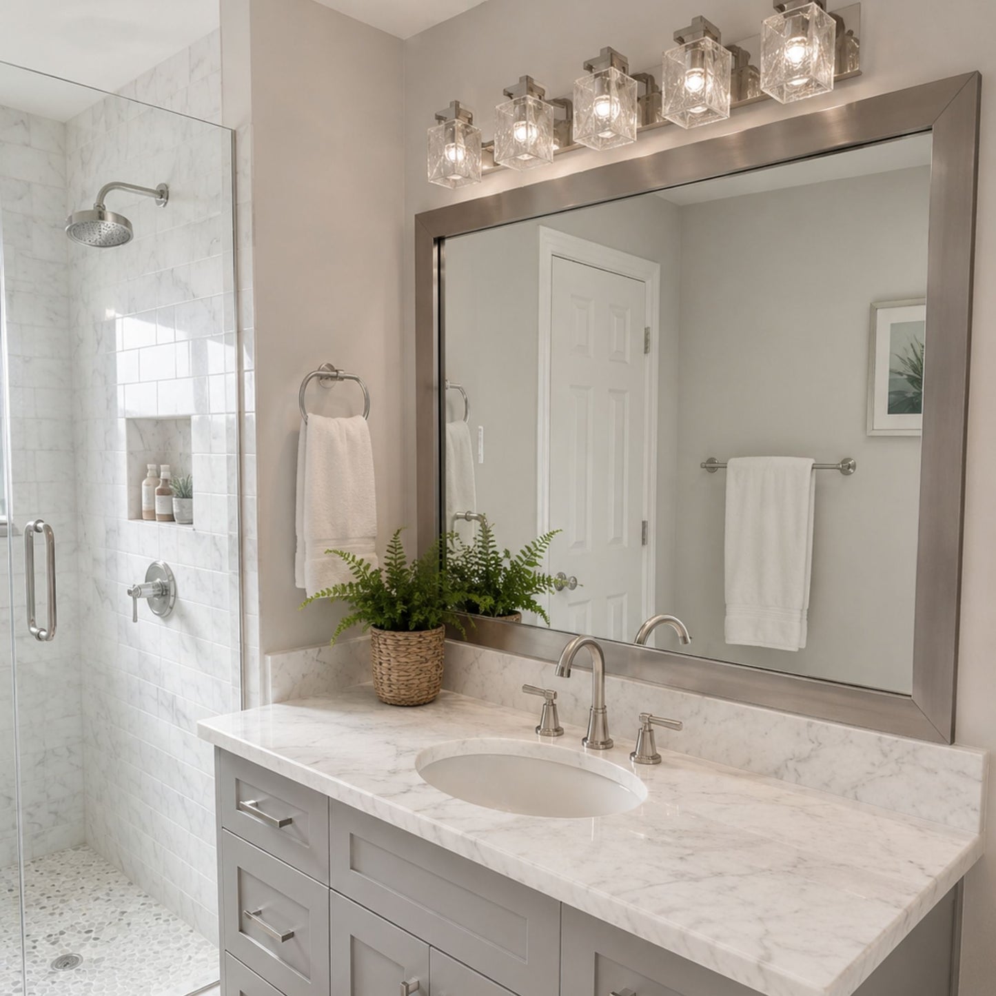 Highline Satin Nickel Slim MirrorMate bathroom mirror frame above a single vanity