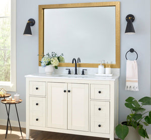 Highline Woven Gold Slim MirrorMate frame on a bathroom vanity mirror