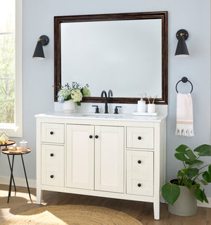 Hudson Antique Bronze MirrorMate frame on a bathroom vanity mirror