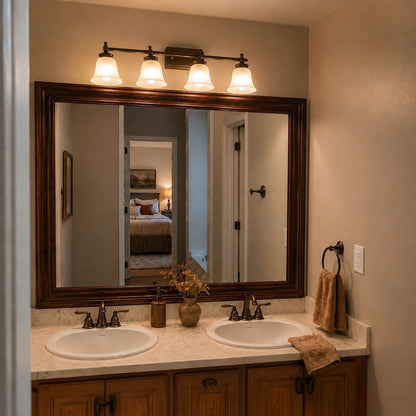 Hudson Antique Bronze MirrorMate bathroom mirror frame above a double vanity