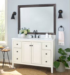 Hudson Midnight Steel MirrorMate frame on a bathroom vanity mirror