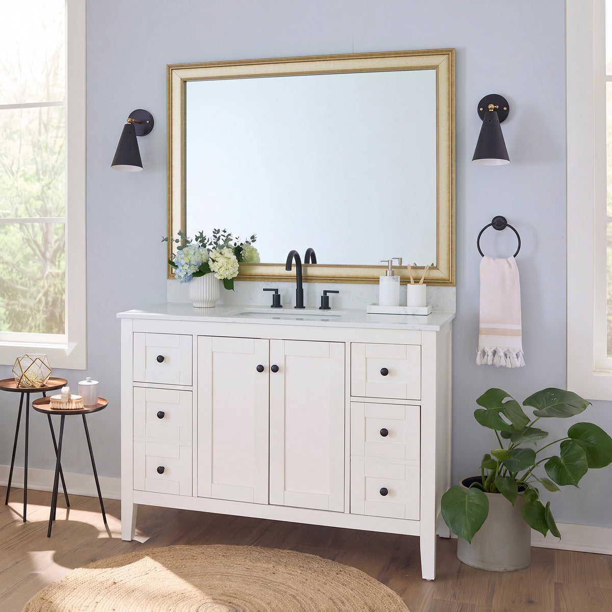 Kelso Gold Washed Silver MirrorMate frame on a bathroom vanity mirror