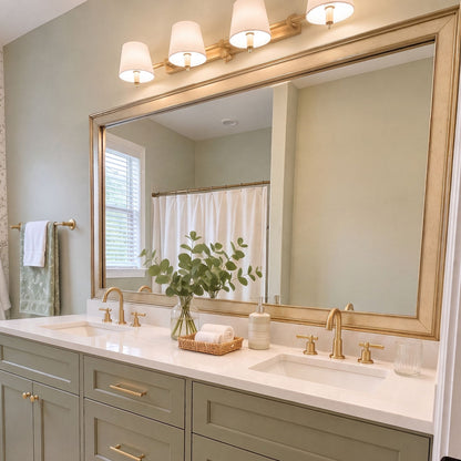 Kelso Gold Washed Silver MirrorMate bathroom mirror frame above a sage green double vanity
