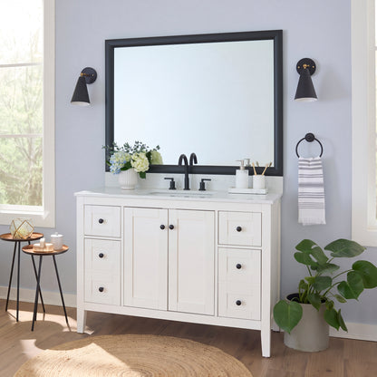 Pemaquid Black Slim MirrorMate frame on a bathroom vanity mirror
