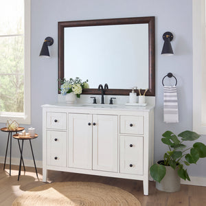 Pemaquid Dark Bronze MirrorMate frame on a bathroom vanity mirror