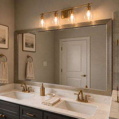 Portage Moonlight Silver MirrorMate bathroom mirror frame above a double vanity with brass fixtures