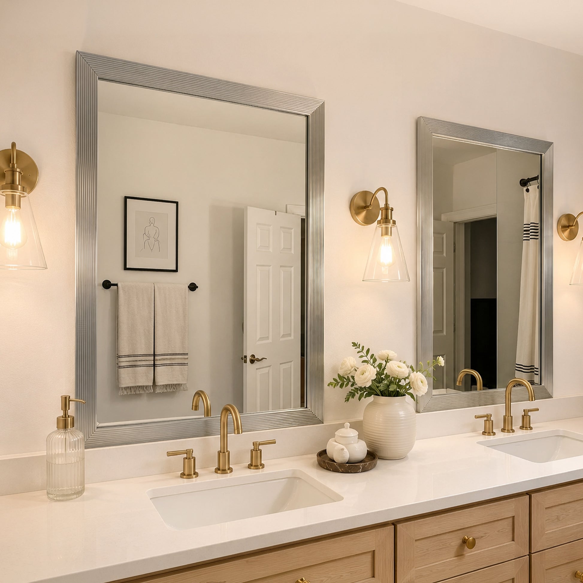 Two Portage Moonlight Silver MirrorMate bathroom mirror frames above a light wood double vanity