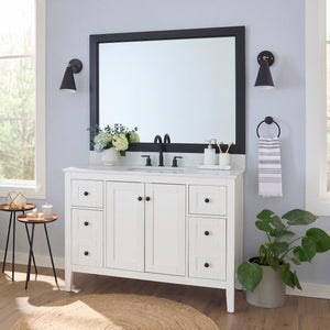 Soho Matte Black MirrorMate frame on a bathroom vanity mirror