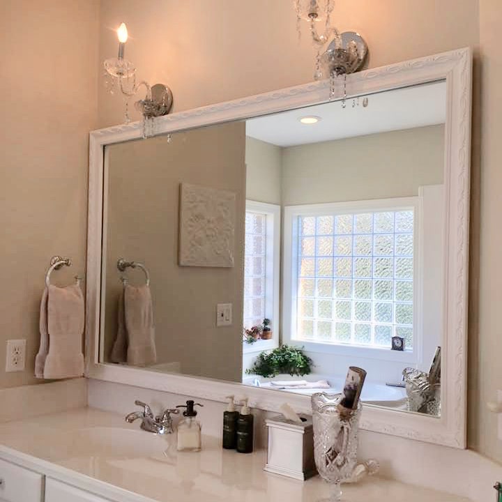 White framed shop bathroom mirror